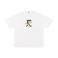 White t-shirt with a shark holding a surfboard graphic on a white background